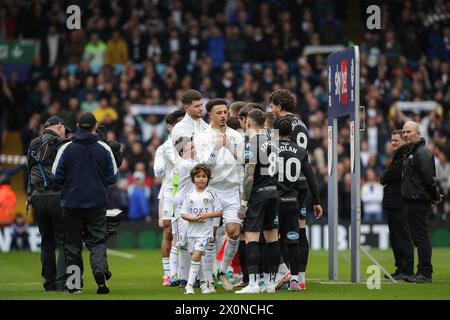 The two teams shake hands before the Sky Bet Championship match Leeds United vs Blackburn Rovers at Elland Road, Leeds, United Kingdom, 13th April 2024  (Photo by James Heaton/News Images) Stock Photo