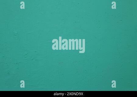 Texture of old green, blue plaster on the wall. Stock Photo