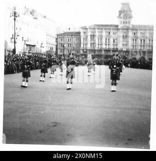 PIPE BAND BEATS RETREAT CEREMONY - The Pipes and Drums of the Band of 1st Btn. London Scottish being played in the Piazza Dell 'Unita' Trieste. Photographic negative , British Army Stock Photo