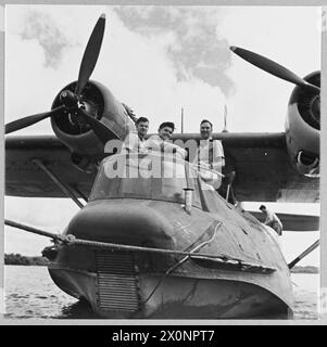 BRITISH OVERSEAS AIRWAYS AT WAR - For story see CH.14892 Picture (issued 1945) shows - The Qantas Catalina flying boat 'VEGA' being towed to her moorings at Kogalla, Ceylon. Photographic negative , Royal Air Force Stock Photo