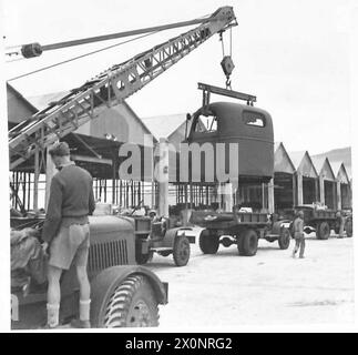 AMERICAN LORRIES ARRIVE IN THE MIDDLE EAST - Lifting a cab on to a chassis Photographic negative , British Army Stock Photo