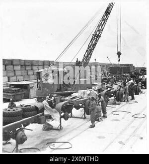 AMERICAN LORRIES ARRIVE IN THE MIDDLE EAST - A line of lorries being assembled. Photographic negative , British Army Stock Photo