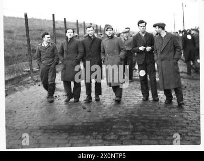 A GERMAN PRISONER-OF-WAR CAMP - Types of German prisoners. Photographic negative , British Army Stock Photo