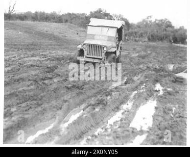 ITALY : FIFTH ARMYANZIO BRIDGEHEADTHE WORLD'S SMALLEST CINEMA - These fields were once green, but many jeeps and light cars have passed over them making the going very rough and slippery. Photographic negative , British Army Stock Photo