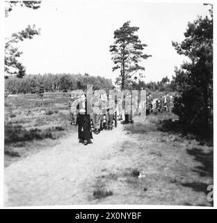 FUNERAL OF MAJOR CHARLES SWEENEY, M.C. - Field Marshal Montgomery at the funeral of Major Charles Sweeney, MC., who was killed whilst escorting a German Admiral back from Kiel, when his car went off the road and crashed into a tree at Celle. Photographic negative , British Army, 21st Army Group Stock Photo