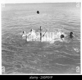 THESE PHOTOGRAPHS WERE TAKEN AT THE REQUEST OF MAJOR RUSTON OF 'PARADE' - A game of Water Polo in progress. Photographic negative , British Army Stock Photo