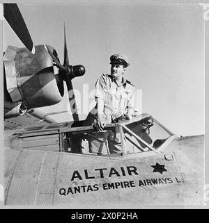 BRITISH OVERSEAS AIRWAYS AT WAR - For story see CH.14892 Picture (issued 1945) shows - Captain Allan McMasters, in command of the Qantas Catalina flying boat 'ALTAIR'. Photographic negative , Royal Air Force Stock Photo