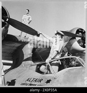 BRITISH OVERSEAS AIRWAYS AT WAR - For story see CH.14892 Picture (issued 1945) shows - Captain Allan McMasters, in command of the Qantas Catalina flyingboat 'ALTAIR'. Photographic negative , Royal Air Force Stock Photo