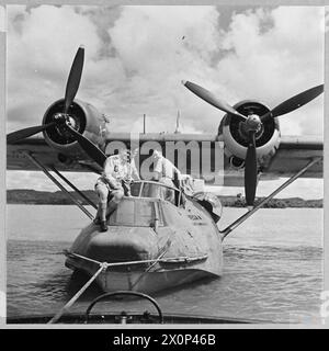 BRITISH OVERSEAS AIRWAYS AT WAR - For story see CH.14892 Picture (issued 1945) shows - The Qantas Catalina flyingboat 'VEGA' being towed to her moorings at Kogalla, Ceylon. Photographic negative , Royal Air Force Stock Photo
