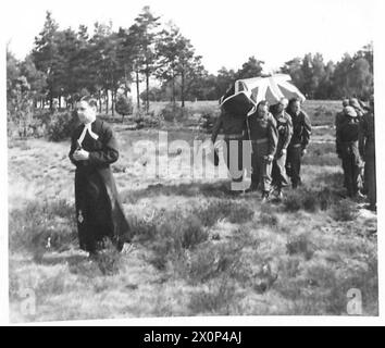 FUNERAL OF MAJOR CHARLES SWEENEY, M.C. - Field Marshal Montgomery at the funeral of Major Charles Sweeney, MC., who was killed whilst escorting a German Admiral back from Kiel, when his car went off the road and crashed into a tree at Celle. Photographic negative , British Army, 21st Army Group Stock Photo