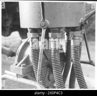 PHOTOGRAPHS TAKEN AT A MOBILE PETROL FILLING CENTRE R.A.S.C. - Showing nozzle hose connections at the header tank Photographic negative , British Army Stock Photo