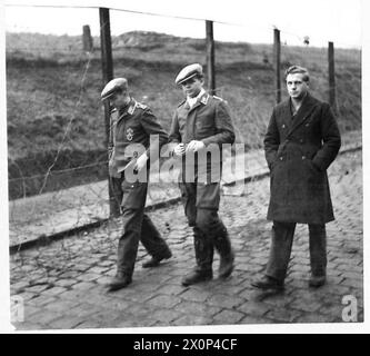 A GERMAN PRISONER-OF-WAR CAMP - Types of German prisoners. Photographic negative , British Army Stock Photo