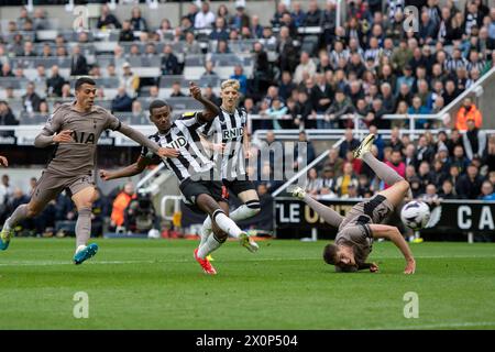 Newcastle United's Alexander Isak shoots and scores the first goal during the Premier League match between Newcastle United and Tottenham Hotspur at St. James's Park, Newcastle on Saturday 13th April 2024. (Photo: Trevor Wilkinson | MI News) Credit: MI News & Sport /Alamy Live News Stock Photo