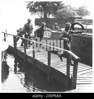 HOME GUARD 'MARINES' - Troops rushing ashore to engage the 'enemy' Photographic negative , British Army Stock Photo