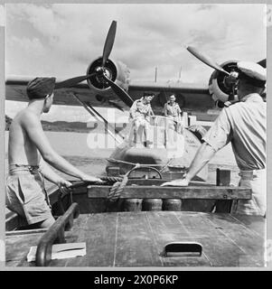 BRITISH OVERSEAS AIRWAYS AT WAR - For story see CH.14892 Picture (issued 1945) shows - The Qantas Catalina flying boat 'VEGA' being towed to her moorings at Kogalla, Ceylon. Photographic negative , Royal Air Force Stock Photo