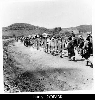 Thousands of Italian soldiers are marched to a prisoner-of-war camp ...