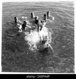 THESE PHOTOGRAPHS WERE TAKEN AT THE REQUEST OF MAJOR RUSTON OF 'PARADE' - A game of Water Polo in progress. Photographic negative , British Army Stock Photo