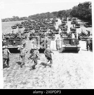 BREN CARRIERS IN ACTION - Crews take up stations in the Bren carriers. Photographic negative , British Army Stock Photo