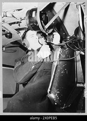 DEFEATING GERMANY'S KEY WEAPON : LIBERATOR v. U-BOAT - For story see CH.9576 (Picture issued 1943) The navigator of a Liberator on patrol gets the 'drift' .............. Photographic negative , Royal Air Force Stock Photo