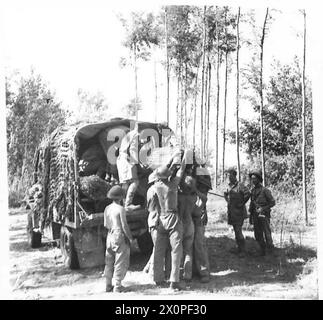 INVASION OF ITALY 'ITS AN ENGINEERS' WAR' - 'Army Track' and canvas matting arrive at the cleared site and are unloaded. The matting is put down first to stop vehicles buckling the wire mesh in soft patches. Photographic negative , British Army Stock Photo