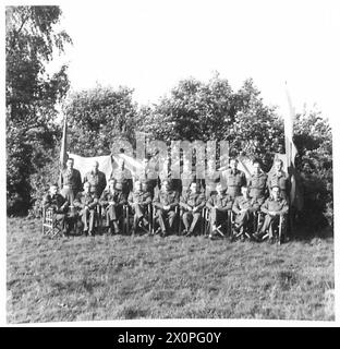 THE ALLIED MILITARY MISSION TO THE 21ST ARMY GROUP - Officers of the Allied Military Mission to the 21st Army Group.Front row, left to right: Col. P. J. de Broekert, the Dutch Military Mission; Col. I. K. Banach, the Polish Military Mission; Lt. Col. O. C. Smith-Bingham, the Liaison Allied Contingents Branch, HQ 21 Army Group; Col. H. Troullier, the French Military Mission; Brig. C. H. M. Petro, the Liaison Allied Contingents Branch, HQ 21 Army Group; Lt. Col. L. E. J. van Oost, the Belgian Military Mission; Lt. Col. G. S. Russell, the Liaison Allied Contingents Branch, HQ 21 Army Group; Col. Stock Photo