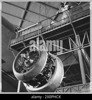 BRITISH OVERSEAS AIRWAYS AT WAR - For story see CH.14892 Picture (issued 1945) shows - Hoisting a new engine to a Boeing flyingboat in the B.O.A.C. workshops at Baltimore. Photographic negative , Royal Air Force Stock Photo