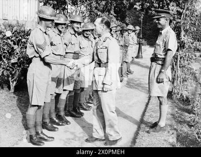 THE BATTLE FOR CRETE, 20 - 31 MAY 1941 - Evacuation: King George of Greece, in Egypt, thanking the New Zealand Platoon which escorted him out of Crete where he had taken refuge after the German occupation of Greece George II, King of Greece Stock Photo