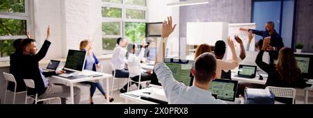 College teacher presents graph with projector in classroom Stock Photo
