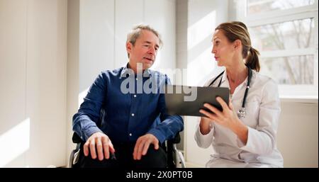 Senior Healthcare Caregiver And Happy Elder Patient Stock Photo