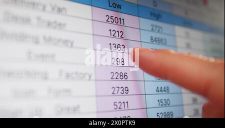 Analyst Employee Working On Spreadsheet Using Touchscreen Monitor Stock Photo