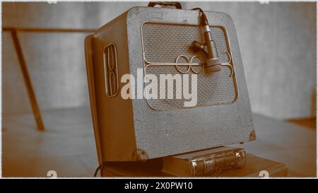 Old guitar amplifier in a retro style photo. Concept of nostalgia. Stock Photo