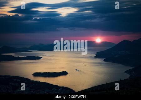 The sun sets over the Adriatic Sea near Dubrovnik in southern, Croatia. Stock Photo