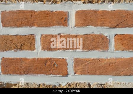 background of handmade red brick with large grout line in Celije Monastery, Valjevo, Serbia Stock Photo