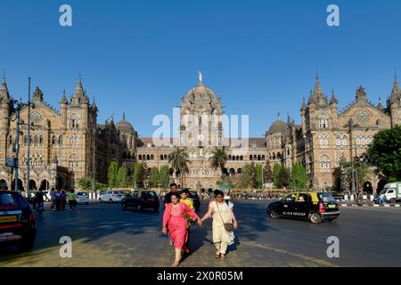 Colonial-era Chhatrapati Shivaji Maharaj Terminus (CSMT), Mumbai's busiest and iconic railway station and a UNESCO heritage building; Mumbai, India Stock Photo