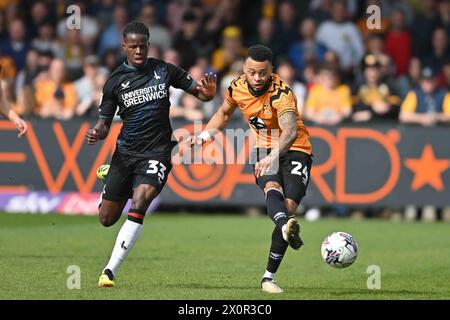 Jordan Cousins (24 Cambridge United) Passes the ball during the Sky Bet League 1 match between Cambridge United and Charlton Athletic at the Cledara Abbey Stadium, Cambridge on Friday 12th April 2024. (Photo: Kevin Hodgson | MI News) Credit: MI News & Sport /Alamy Live News Stock Photo