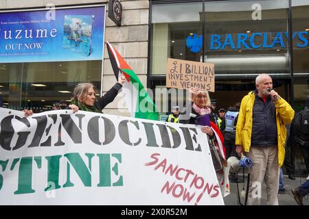 Glasgow, UK. 13th Apr, 2024. A small number of pro Palestine and anti Israel demonstrators demonstrated from George Square, Glasgow to outside the Barclays Bank branch, Argyll Street, Glasgow, encouraging bank customers to boycott the organisation claiming Barclays were funding Israel. Credit: Findlay/Alamy Live News Stock Photo