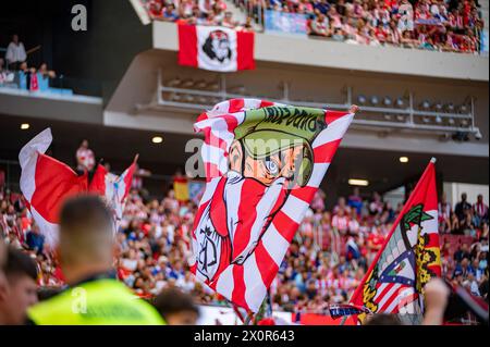 Madrid, Madrid, Spain. 13th Apr, 2024. Atletico Madrid fans choreography flags during the La Liga EA Sports football match between Atletico Madrid and Girona FC at Estadio Civitas Metropolitano on April 13, 2024 in Madrid, Spain. (Credit Image: © Alberto Gardin/ZUMA Press Wire) EDITORIAL USAGE ONLY! Not for Commercial USAGE! Stock Photo