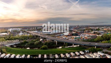 Aerial landscape view of Doncaster cityscape skyline with rail and road transport links serving the South Yorkshire city centre with travellers carava Stock Photo