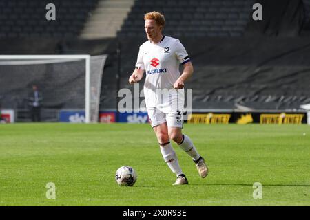 Milton Keynes Dons captain Dean Lewington during the second half of the Sky Bet League 2 match between MK Dons and Mansfield Town at Stadium MK, Milton Keynes on Saturday 13th April 2024. (Photo: John Cripps | MI News) Credit: MI News & Sport /Alamy Live News Stock Photo