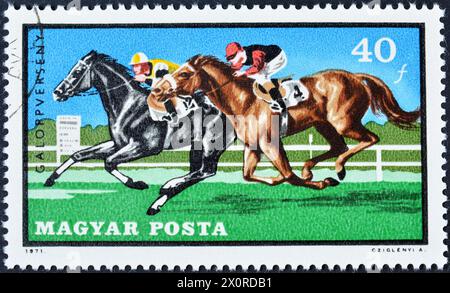Cancelled postage stamp printed by Hungary, that shows Horse racing,  circa 1971. Stock Photo
