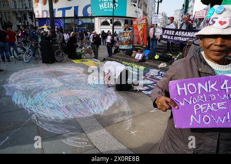 RECORD DATE NOT STATED Protest for Julian Assange at Piccadilly Circus in London Protest for Julian Assange at Piccadilly Circus in London. This week marks 5 years since his capture and incarceration. London England United Kingdom Copyright: xJoaoxDanielxPereirax Stock Photo