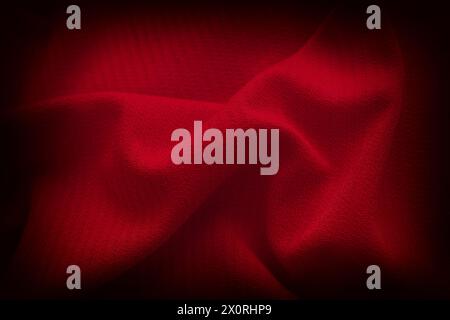A crumpled red fabric background. Close up. Stock Photo