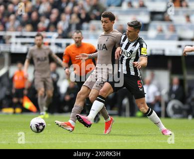 Newcastle Upon Tyne, UK. 13th Apr, 2024. Fabian Schar of Newcastle United in action with Brennan Johnson during the Premier League match at St. James' Park, Newcastle Upon Tyne. Picture credit should read: Nigel Roddis/Sportimage Credit: Sportimage Ltd/Alamy Live News Stock Photo