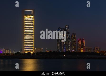 A picture of the Etihad Towers and the Abu Dhabi National Oil Company Headquarters at night. Stock Photo
