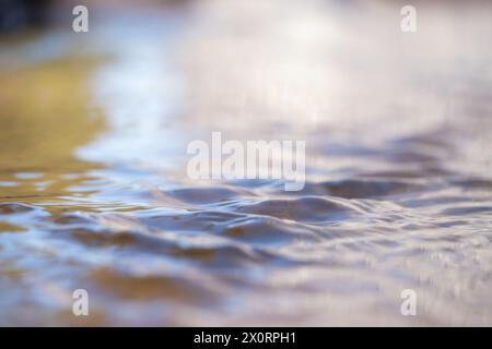Water surface close up. Abstract background of water surface with waves Stock Photo