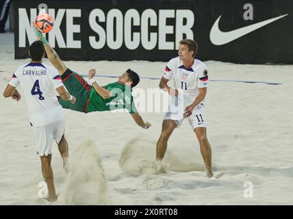 USA beach soccer team plays against the team from Mexico in the Beach Soccer world championship. Stock Photo