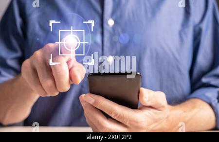 Using mobile phone, finger clicking on button, ai digital technology. Stock Photo
