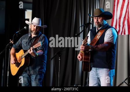 Dusty Moats and Jesse Jennings perform at Country on the Coast 2024 at The Gaiety Suite, Portsmouth, Hampshire, UK Stock Photo