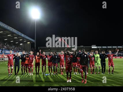 Denderleeuw, Belgium. 13th Apr, 2024. Essevee's players celebrate after winning a soccer match between Dender EH and SV Zulte Waregem, Saturday 13 April 2024 in Denderleeuw, on day 29/30 of the 2023-2024 'Challenger Pro League' second division of the Belgian championship. BELGA PHOTO JOHN THYS Credit: Belga News Agency/Alamy Live News Stock Photo