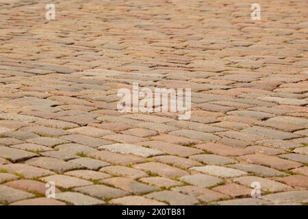 Street pavement texture in tiles. Grey rectangular old tiles. For text. Background. Horizontal. Stock Photo